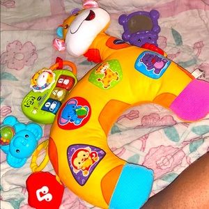 Tummy time pillow with toys